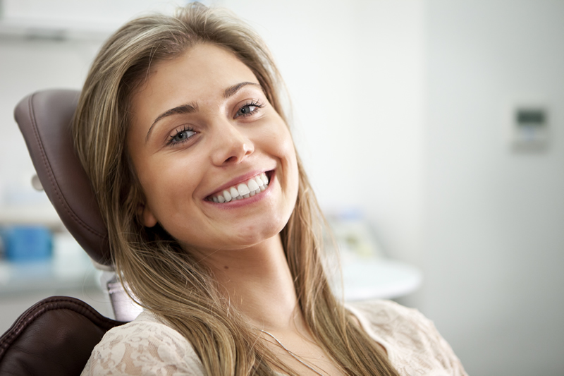 North York dentist - Sleep Dentistry - woman smiling in dental chair